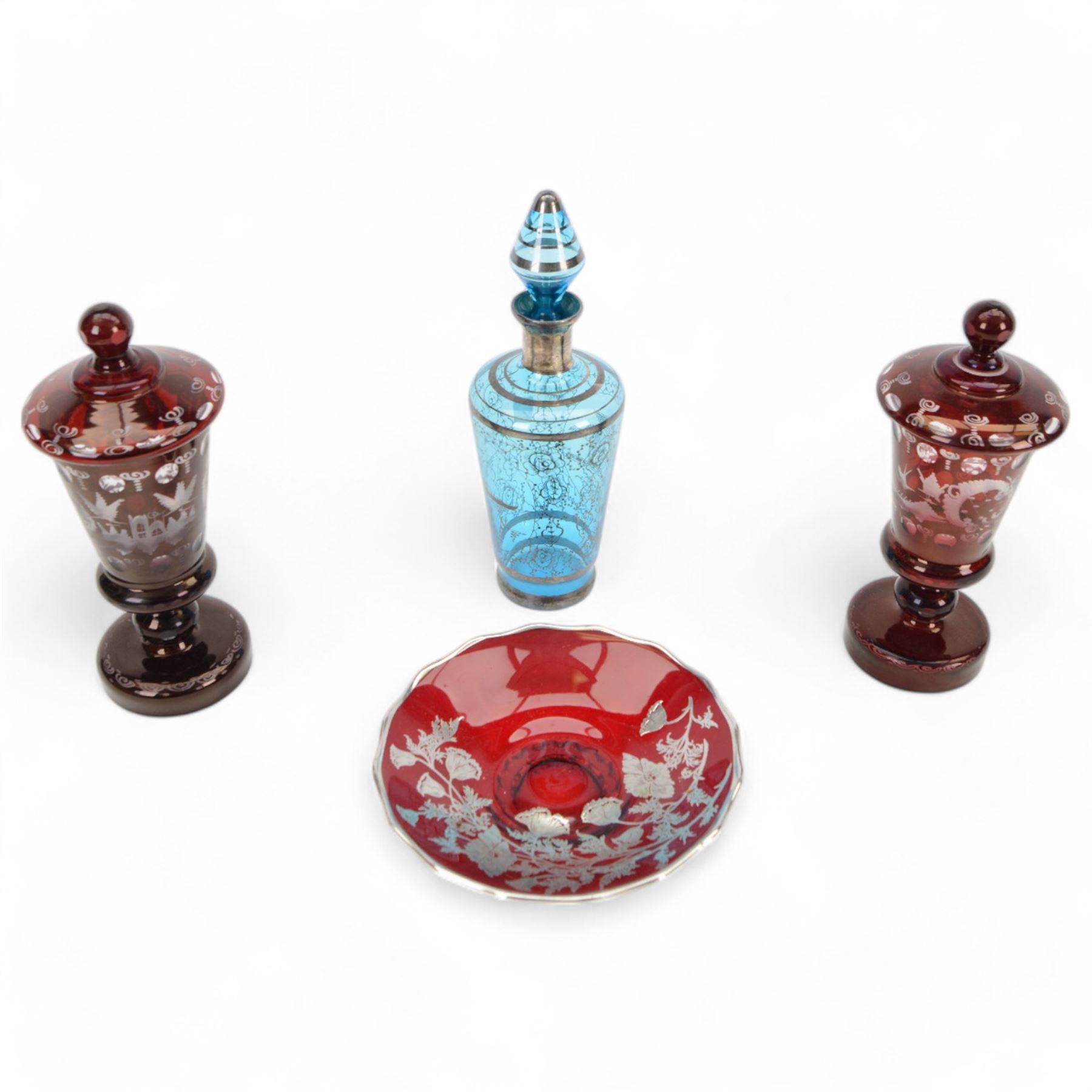 Pair of Victorian Bohemian ruby glass goblet and cover, together with a blue glass decanter and a ruby plate with silvered overlay, goblets H24cm 