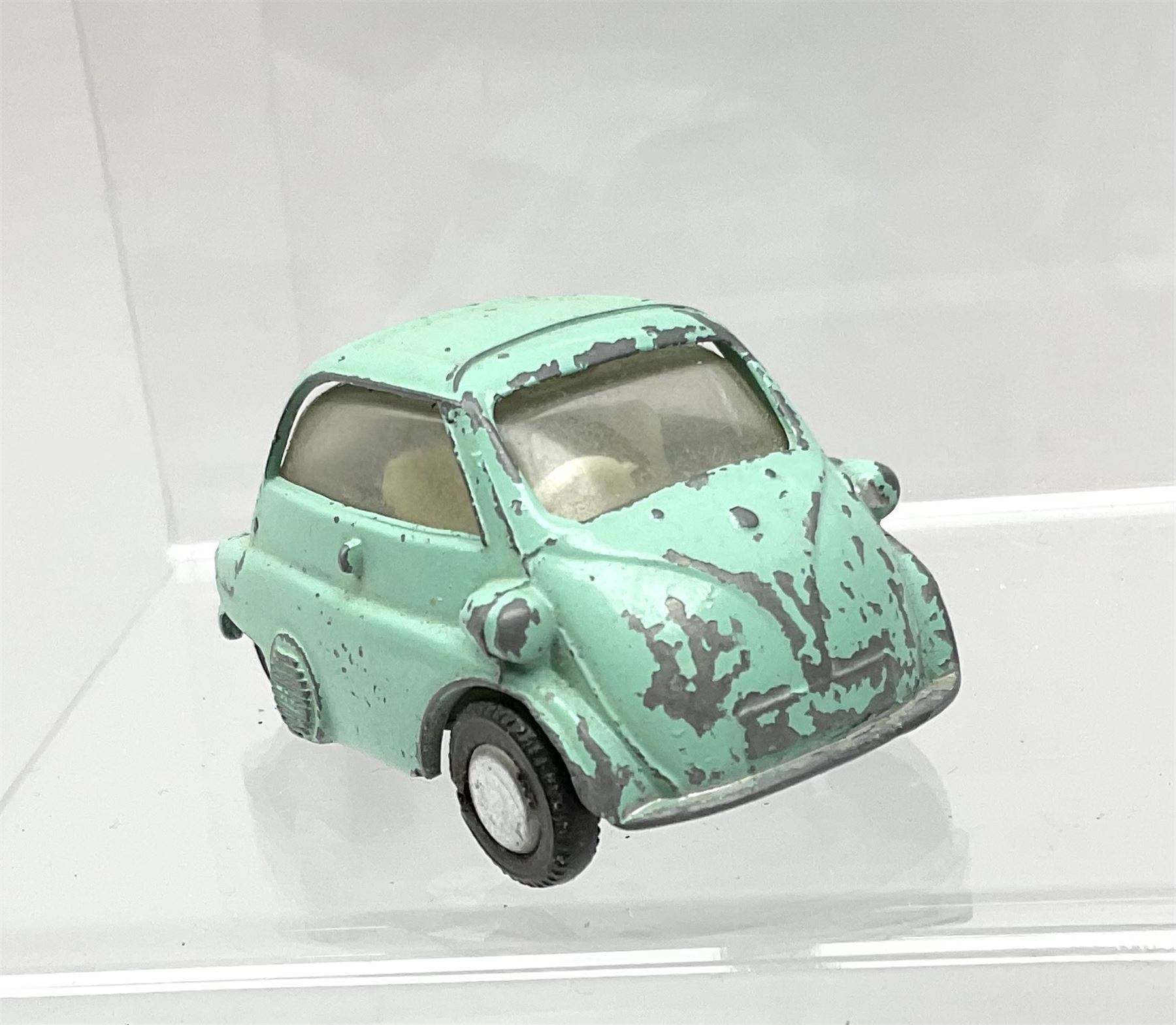 Chad Valley Wee-Kin - six unboxed and playworn clockwork models comprising Milk Tanker; Hillman Minx and another saloon car; Commer Avenger Coach; and two double deck buses; together with Tri-ang Spot-On Armstrong Siddeley Sapphire and BMW Isetta bubble car (8)