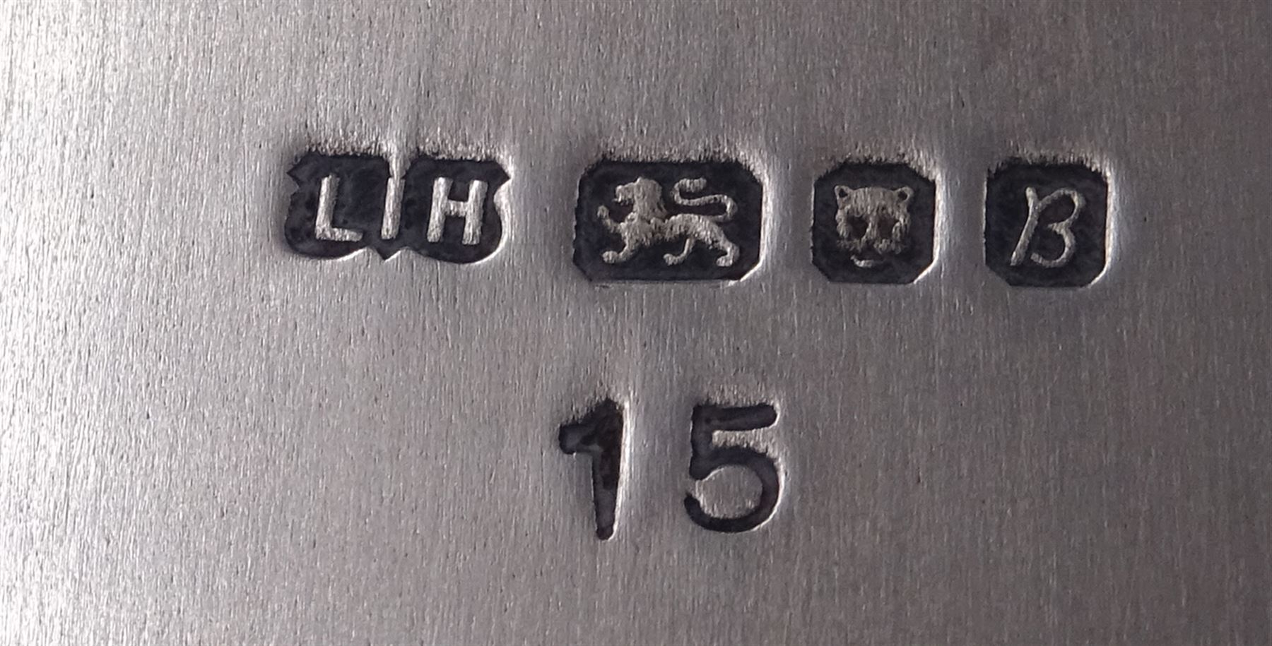 Modern limited edition silver salver, celebrating the achievements of Grundy, champion racehorse of 1975, each of circular form with gadrooned rim and plaque to centre depicting jockey mounted upon Grundy, designed by Stuart Devlin, limited edition no. 15/500, hallmarked London 1976, makers mark LH, D23cm, within silver lined fitted box and limited edition certificate 