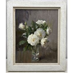 John Richard Townsend (British 1930-): Still Life of White Roses in a Glass, oil on board signed with monogram 37cm x 29cm