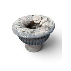 Carved sandstone garden urn, gadrooned campana form