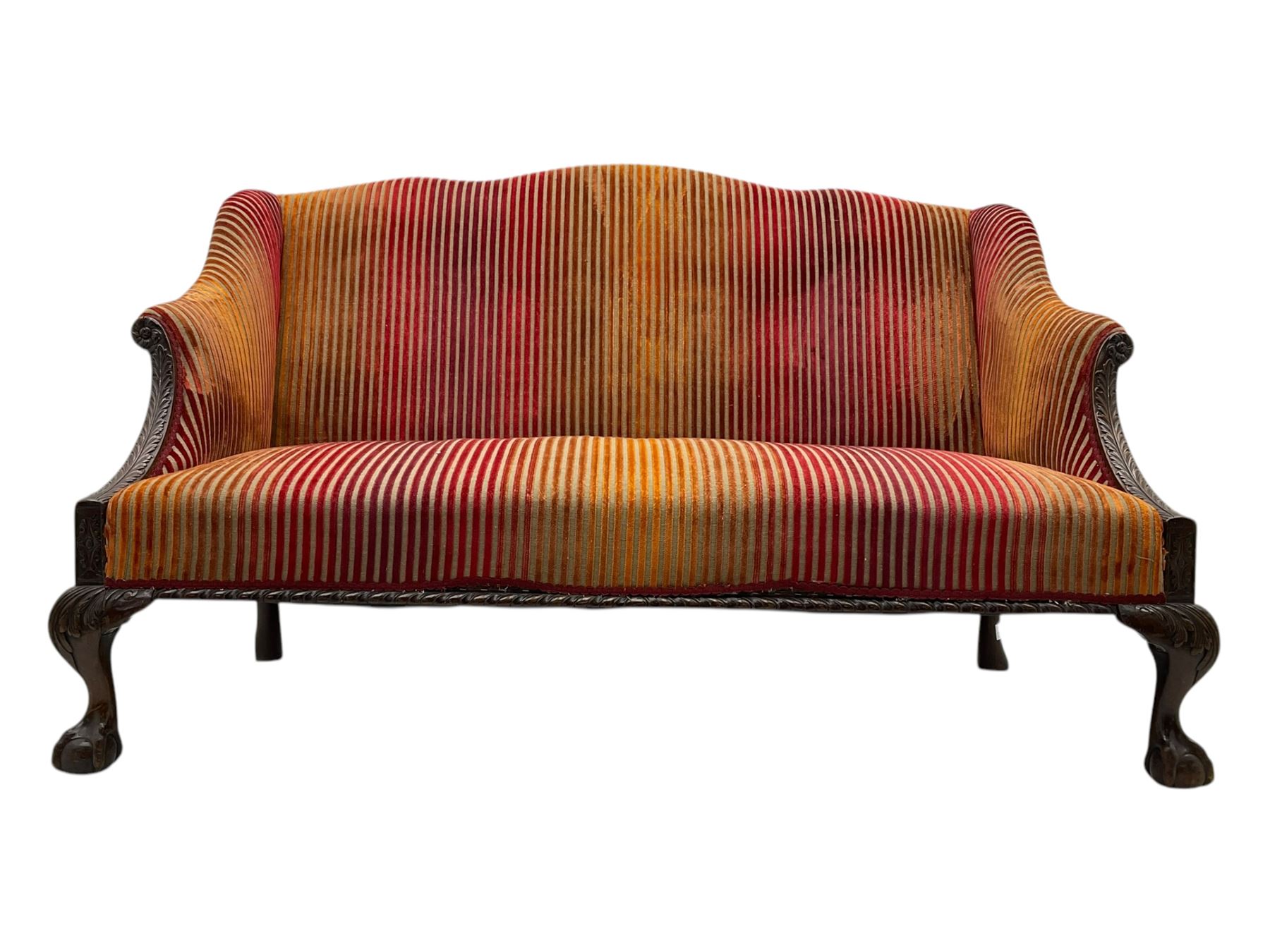 Mid-19th century mahogany two-seat sofa, upholstered in striped velvet fabric, the shaped backrest leading to outward-curved arms, carved apron with scrolling foliate details, raised on cabriole supports terminating in claw and ball feet