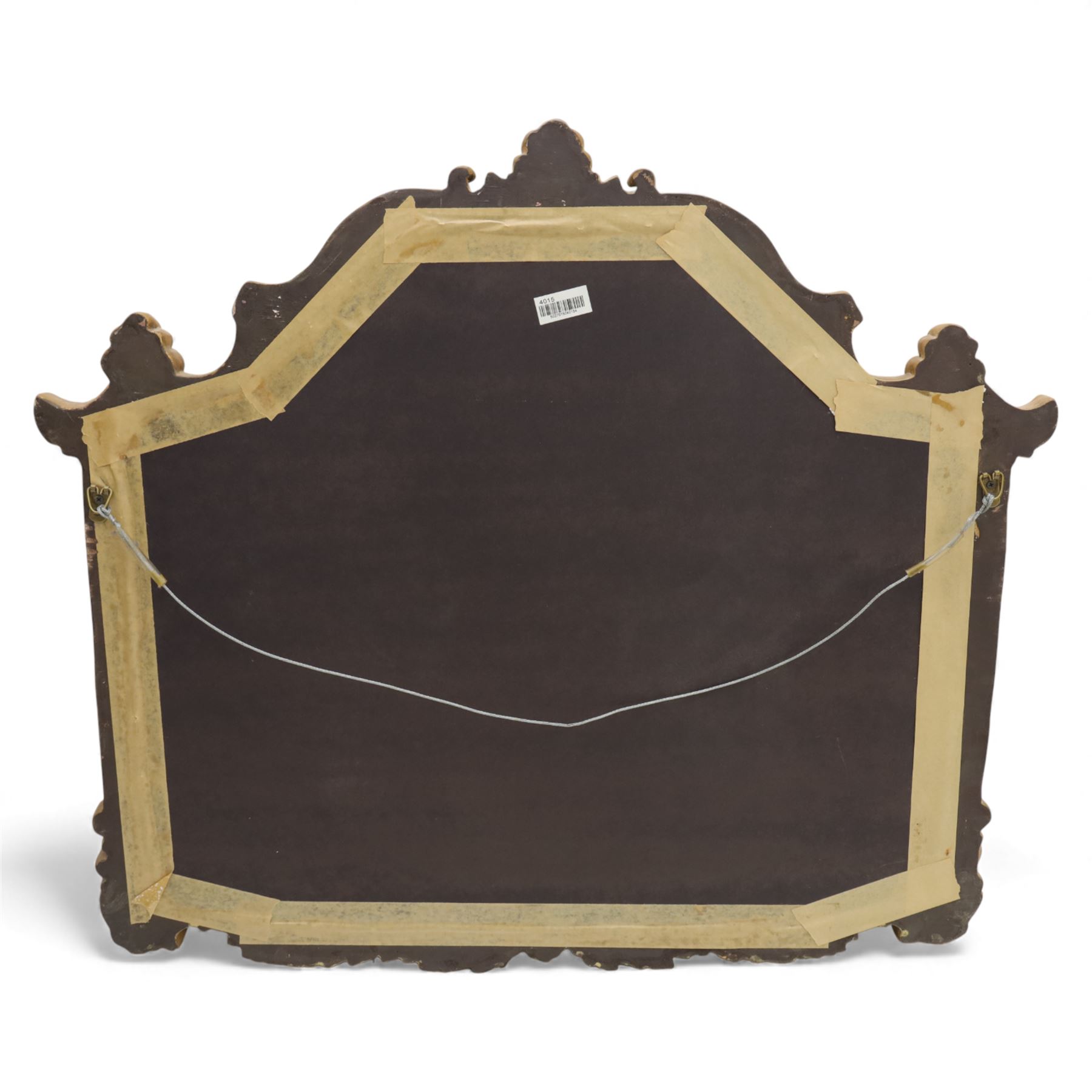 Late 20th century giltwood and composition over mantel mirror, with shaped and scrolled cresting centred by a shell cartouche, with foliate moulded shoulders and lower rail framing a rectangular plate