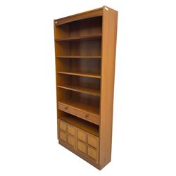 Nathan - mid-20th century teak bookcase, fitted with four adjustable shelves, over two drawers and two cupboards