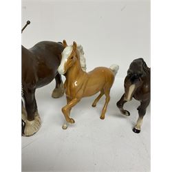 Group of Beswick figures of horses, to include a Palomino horse, Bay Shire horse, recumbent bay foal etc, all with printed marks beneath (5)