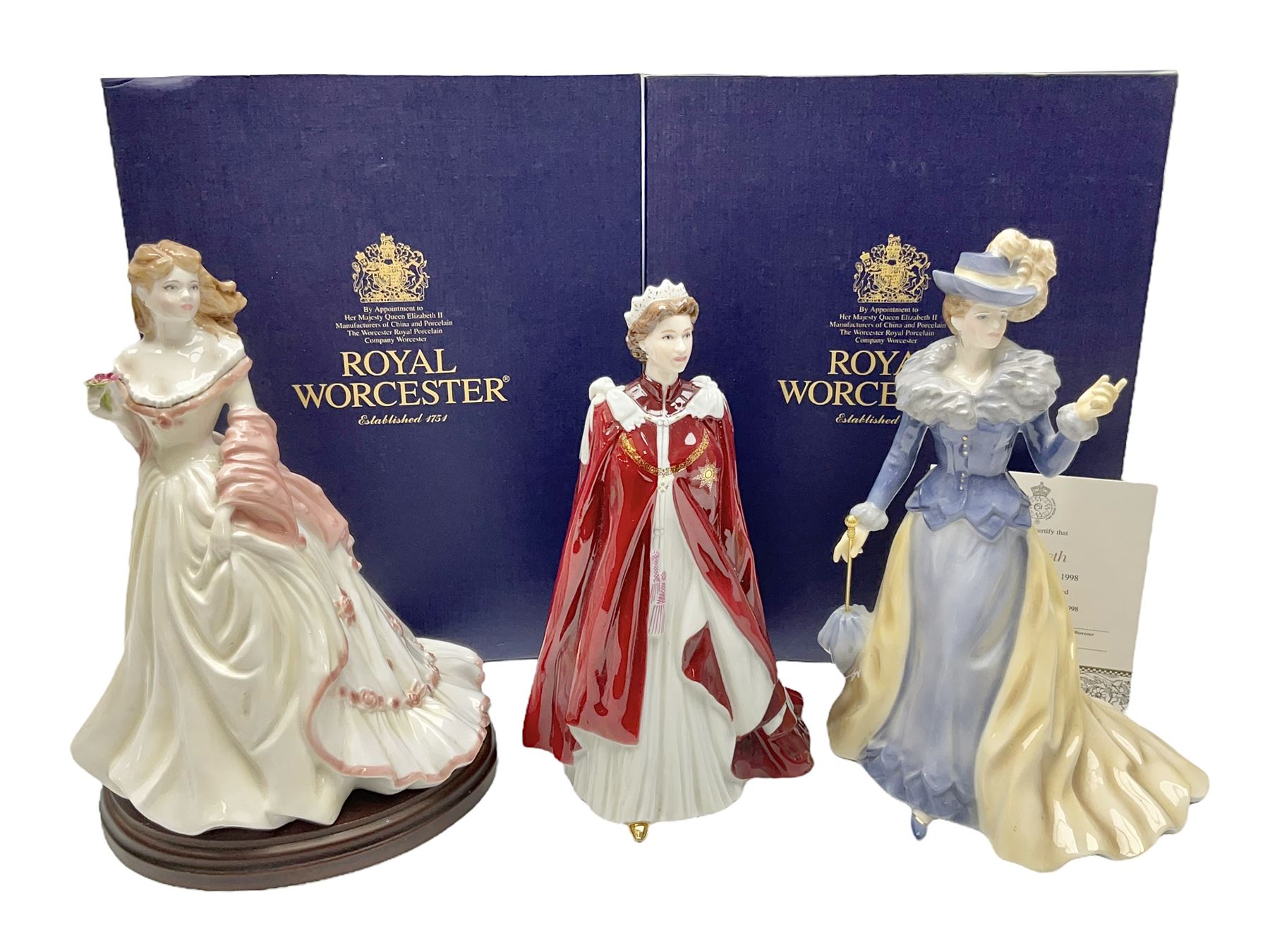 Three Royal Worcester figures, comprising Glyndebourne, with original box, Royal Worcester Special Even 1998 Elizabeth, with certificate and original box, and In Celebration of the Queens 80th Birthday 2006 