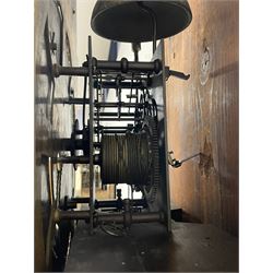 Thomas Hutchinson of Leeds - 18th century 8-day oak longcase clock with as broken arched  pediment and moulded cornice, with a conforming hood door flanked by plain turned pilasters with gesso capitals,  long trunk door with a wavy top on a square plinth with a raised panel, brass dial with cast spandrels,  engraved silvered dial centre and chapter ring with Roman numerals, five minute Arabic's and minute track, with pierced steel hands, seconds pointer,  arched calendar aperture and silvered boss engraved with the makers name to the break arch, dial pinned to a rack striking two train movement with a recoil anchor escapement. With weights and pendulum. Thomas Hutchinson is recorded as working in Leeds from 1760-90.