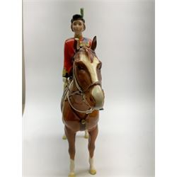 A Beswick model of HM Queen Elizabeth II mounted on Imperial Trooping the colour 1957, model no 1546, H26.5cm.