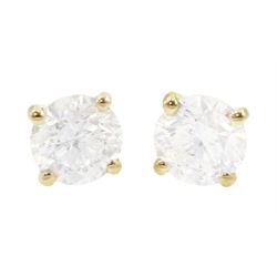 Pair of 18ct gold round brilliant cut diamond stud earrings, total diamond weight 1.03 carat, with World Gemological Institute Report