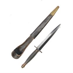 British Fairbairn-Sykes Commando fighting knife with unmarked 17cm double edged blade, ova...