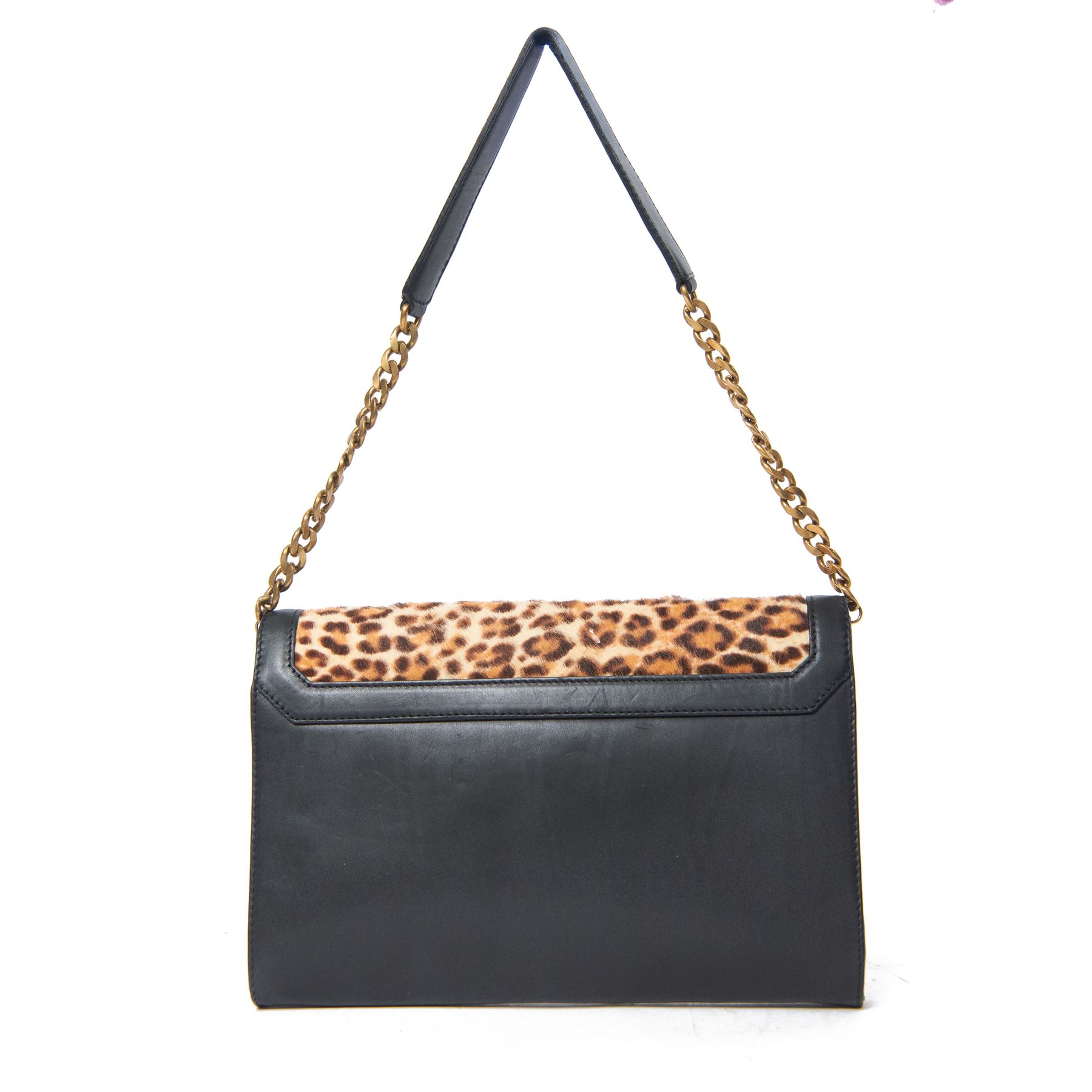 Jimmy Choo black leather and leopard-print calf hair shoulder bag, the rectangular form with leopard-print flap panel, gold-tone push-lock fastening and chain-link shoulder strap with leather shoulder pad, suede-lined interior with zip pocket and maker’s plaque stamped Jimmy Choo Made in Italy, with dust bag