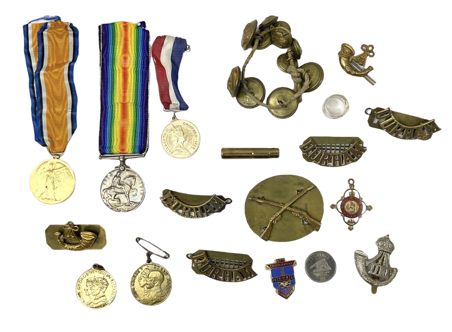 WW1 pair of medals comprising British War Medal and Victory Medal awarded to 24085 Sjt. J. Hazle Durh. L.I.; together with Durham Light Infantry cap and collar badges, shoulder titles, buttons etc; various royalty commemorative medallions etc
