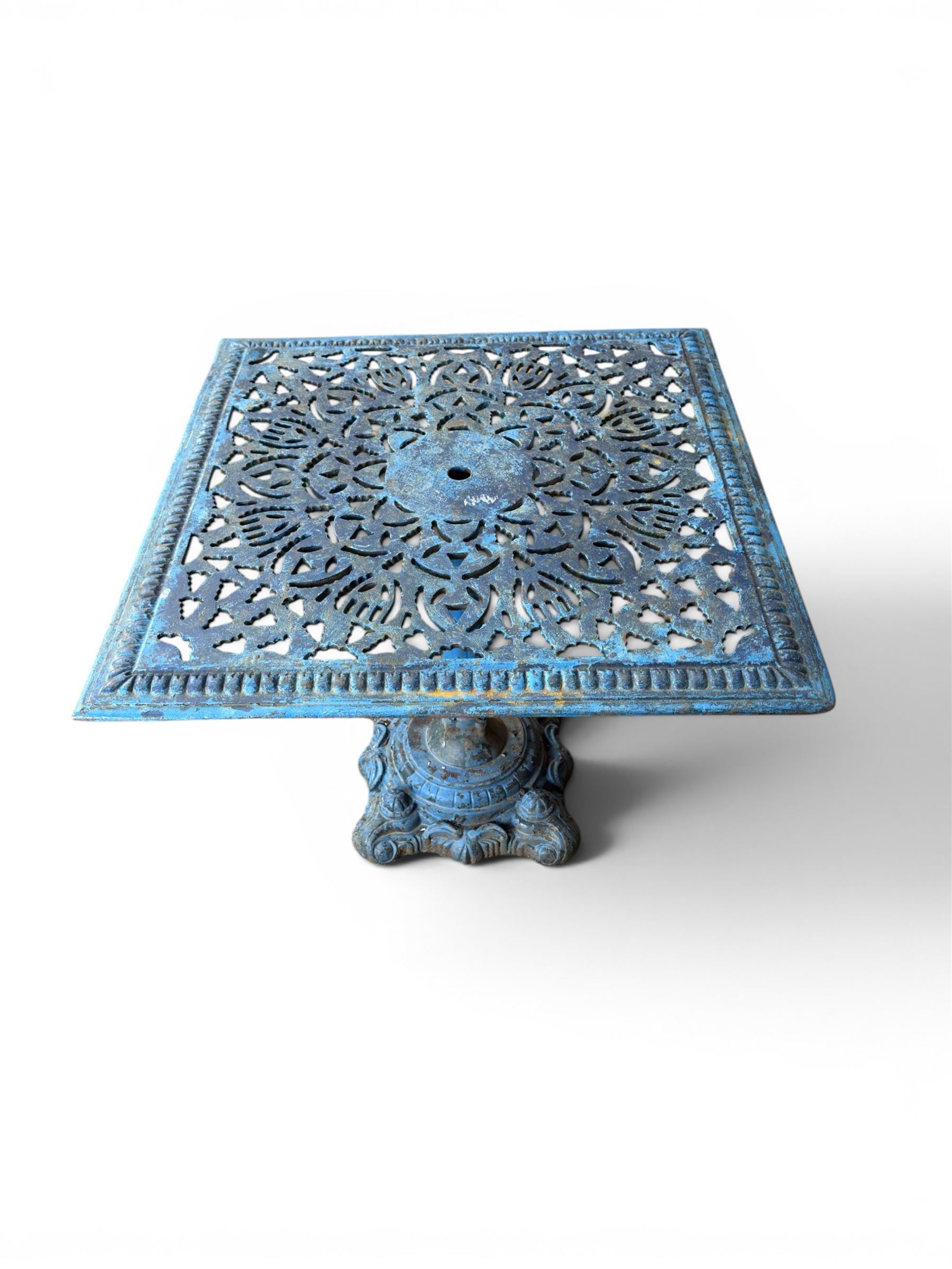 Victorian revival ornate cast iron garden table, pierced square top, pedestal base, finished in distressed blue paint