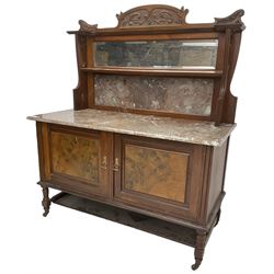 Late Victorian walnut washstand, raised back with carved pediment over bevelled mirror and marble panels, rectangular marble top, fitted with two figured panel doors, on turned supports