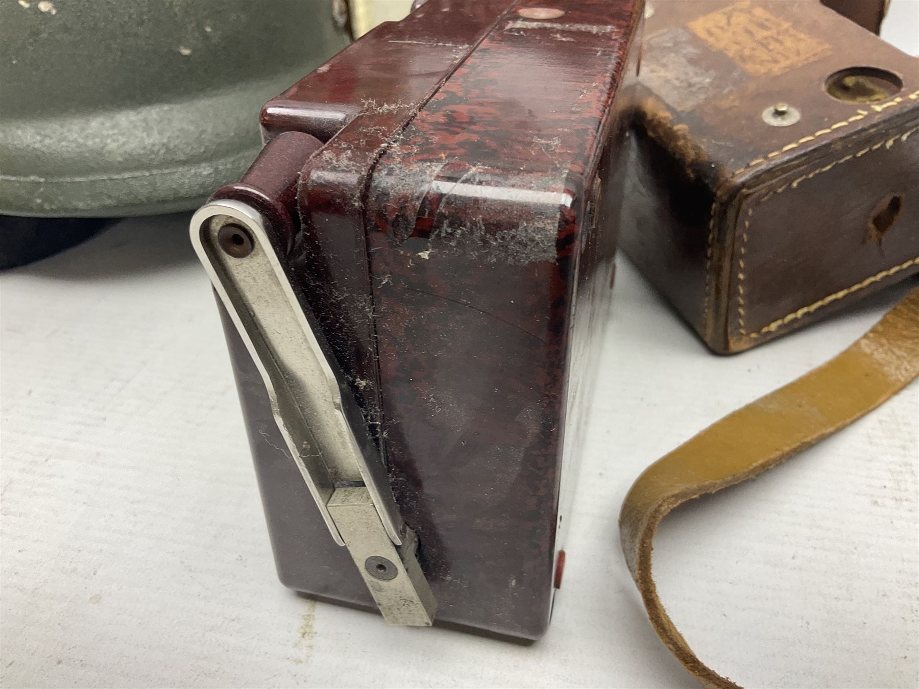 Bakelite cased Megger Insulation tester, by Evershed and Vignoles Ltd, Acton Lane Works, Chiswick, London W4, RW Munro Ltd air speed knots gauge, American green army helmet, The War Illustrated, WW2 aircraft photographic postcards, etc