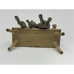 After Bergmann, two cold painted bronze figures, the first modelled as two cats on a bench hugging, the second a cat caning a kitten