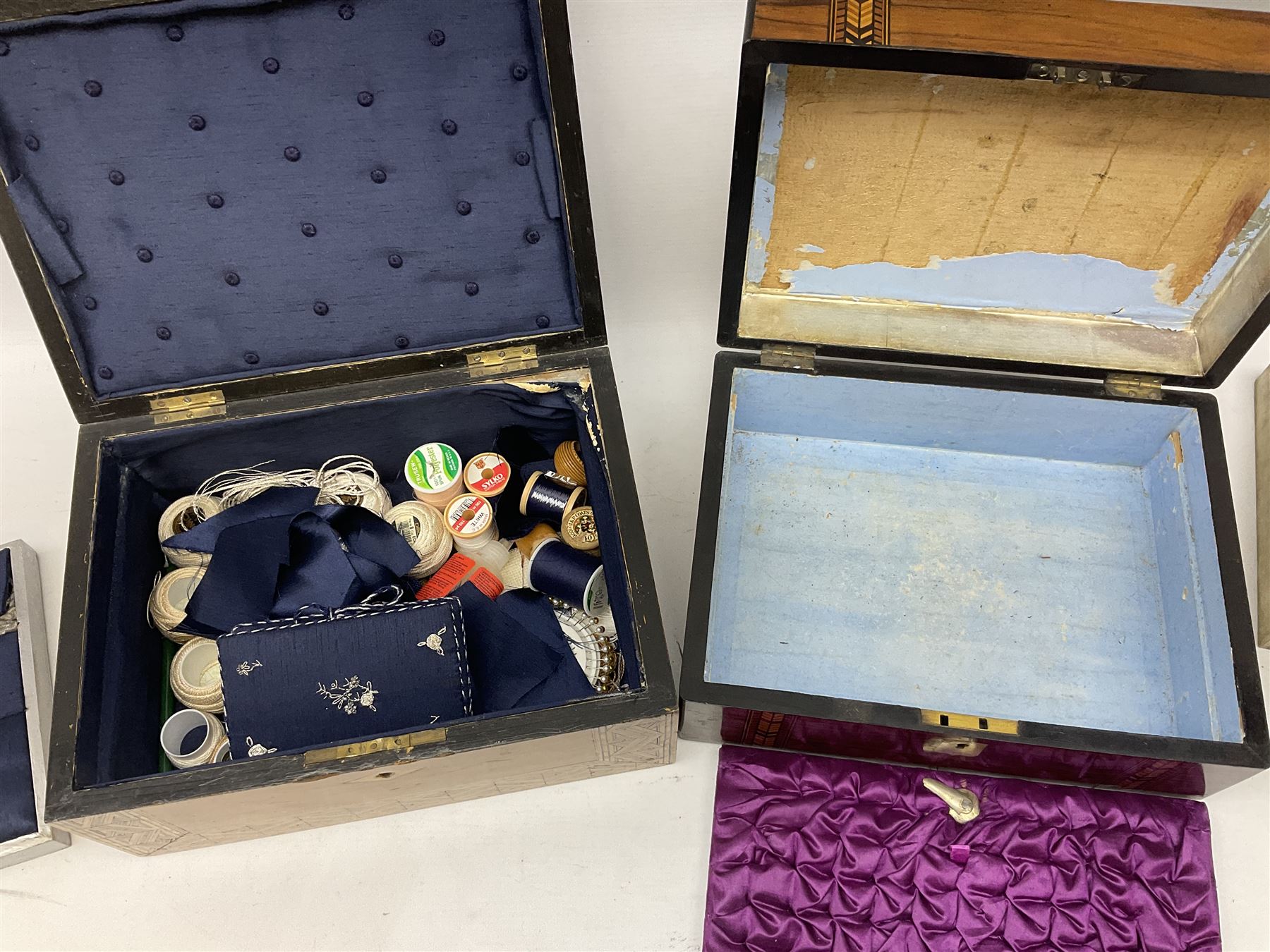 Oak sewing box with geometric inlaid decoration, the hinged lid lifting to reveal compartmented interior with lift out tray together with another mahogany example with mother of pearl and marquetry inlay decoration, both for restoration, largest H15cm W30cm D22cm