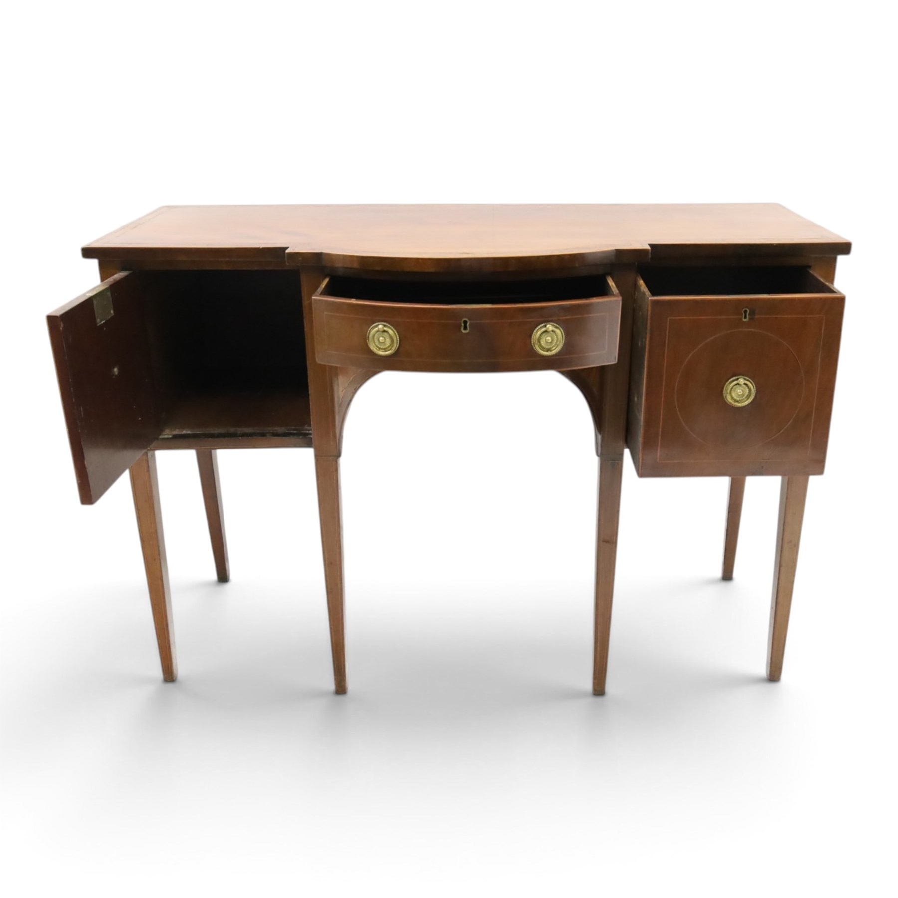 Regency period inlaid mahogany bow-breakfront sideboard, shaped rectangular top with crossbanding and ebony stringing, central convex frieze drawer flanked by cupboard and cellarette drawer, over fan-inlaid spandrels, raised on square tapering supports