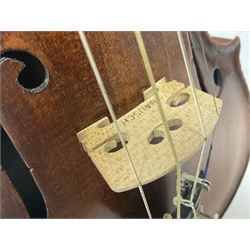 19th century full sized violin in a later hard case, decorative mother of pearl inlay to the tail piece Overall length 60cm No bow