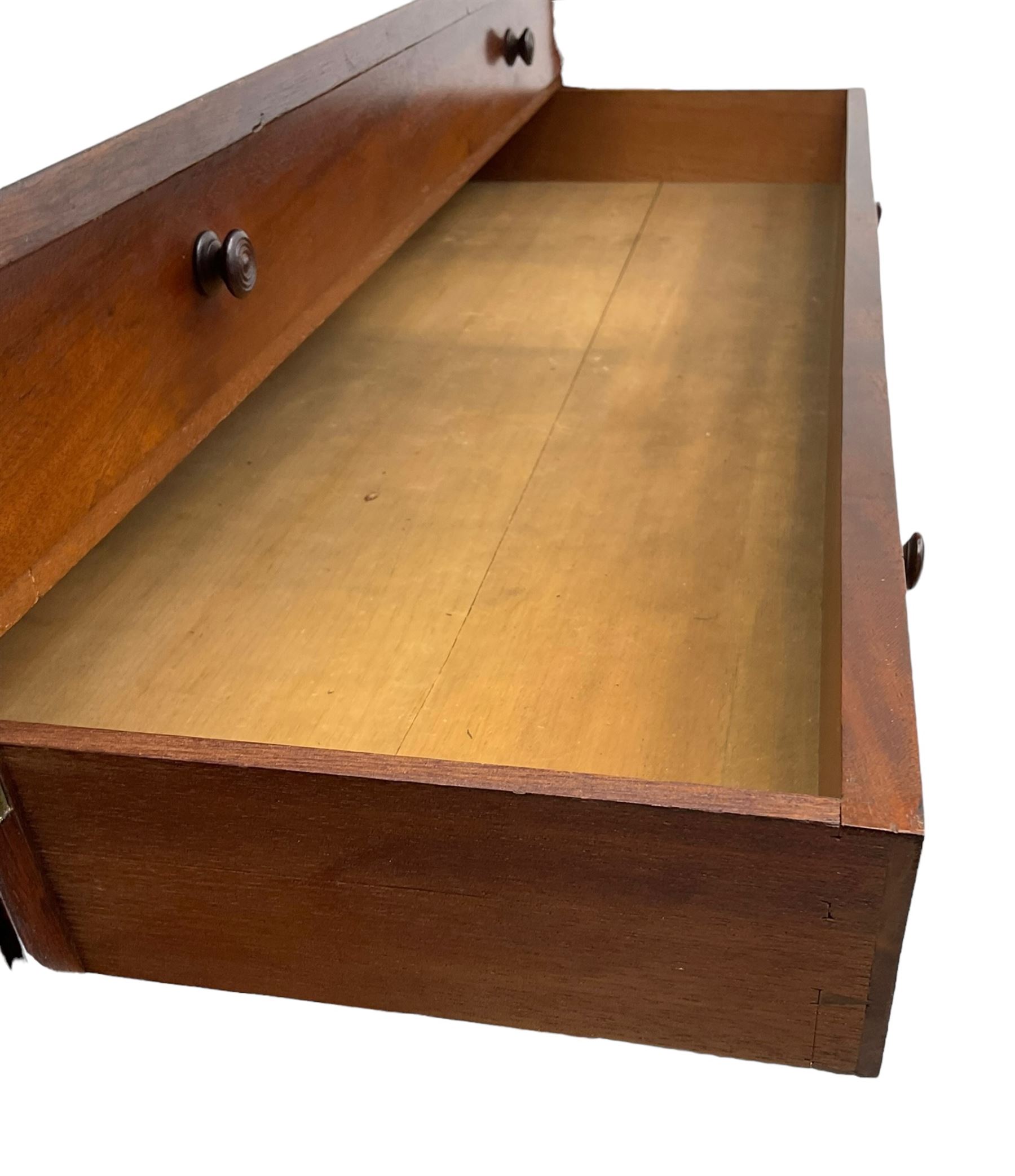 19th century mahogany collector's cabinet, crossbanded rectangular top over two panelled doors, the interior fitted with seven shallow drawers, on bracket feet