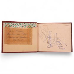 1950s autograph book, containing mostly motorcycle racing signatures, including four-time World Sidecar Champion Eric Oliver, 1952 Sidecar World Champion Cyril Smith and1955 Junior TT Champion Jack Bailey, in red leather case with gilt lettering 