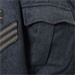 WWII Royal Air Force battle dress blouse, belonging to Flight Sargent Colin Scott 3011422, dated 1945, tailors label for M & N Horne Ltd 1945, Size No 7, blue cloth, Signaller cloth brevet, wireless officers patch to right sleeve and braid sergeant stripes to both sleeves, together with his flight log book, postings & Movements, Royal Air Force Service and Release Book, photographs etc  