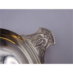 Large modern silver Quaich, of circular form with twin handles cast with stylised dragon motifs, hallmarked Birmingham 2009, makers mark W&W, D18cm, approximate weight 11.14 ozt (346.8 grams)