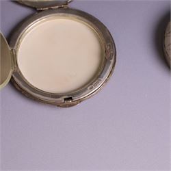 Two silver circular compacts, including Continental 800 silver example with geometric decoration, stamped 800 and a Kigu example with engine turned concentric circle decoration, hallmarked Kigu Ltd, London 1963, largest D7.5cm