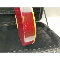 1980s Les Paul Epiphone limited edition cut-away electric guitar by Gibson, the burgundy coloured body with two pick-ups, volume and tone knobs and scratch plate, original tuning pegs, serial no.U6030215, 101cm overall; in modern Kinsman fitted carrying case