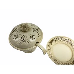 20th century Leeds creamware, comprising chestnut basket and stand, small tureen and cover, ladle, and associated stand, candlestick with stem modelled as a dolphin, teapot, tureen and cover in the form of a melon with fixed stand, and toast rack (toast rack a/f), each with impressed mark beneath. 