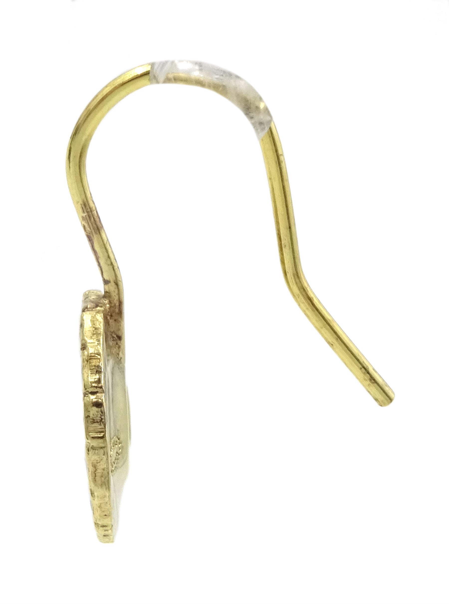 Silver-gilt white enamel daisy pendant necklace and matching pair of pendant earrings by Georg Jensen