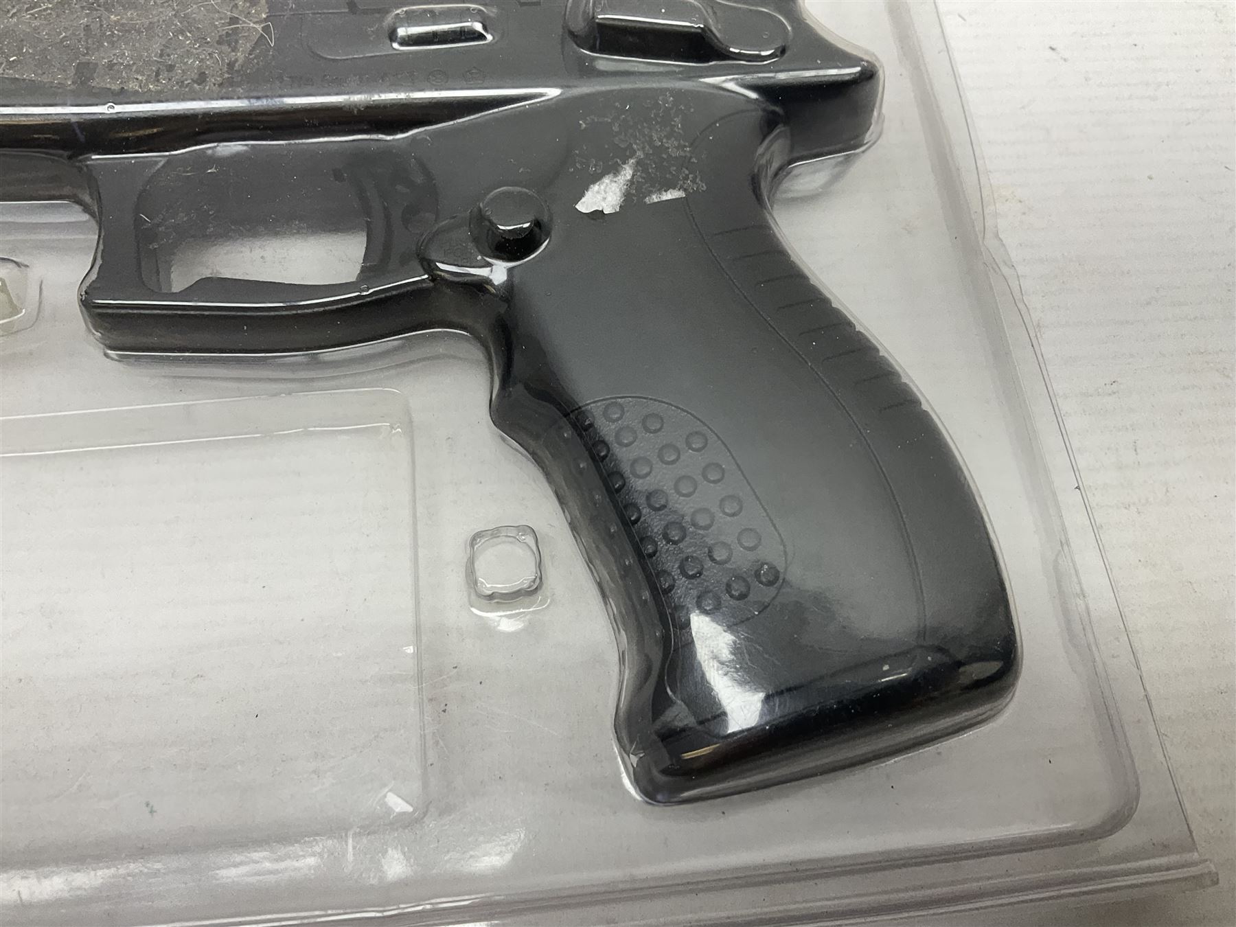 Marksman 1018 spring action BB pistol, serial no.121912951321, L27cm in original packaging with ball dispenser; and KWC .177 cal. CO2 revolver, serial no.31128882, L31cm (2)  NB: AGE RESTRICTIONS APPLY TO THE PURCHASE OF AIR WEAPONS.