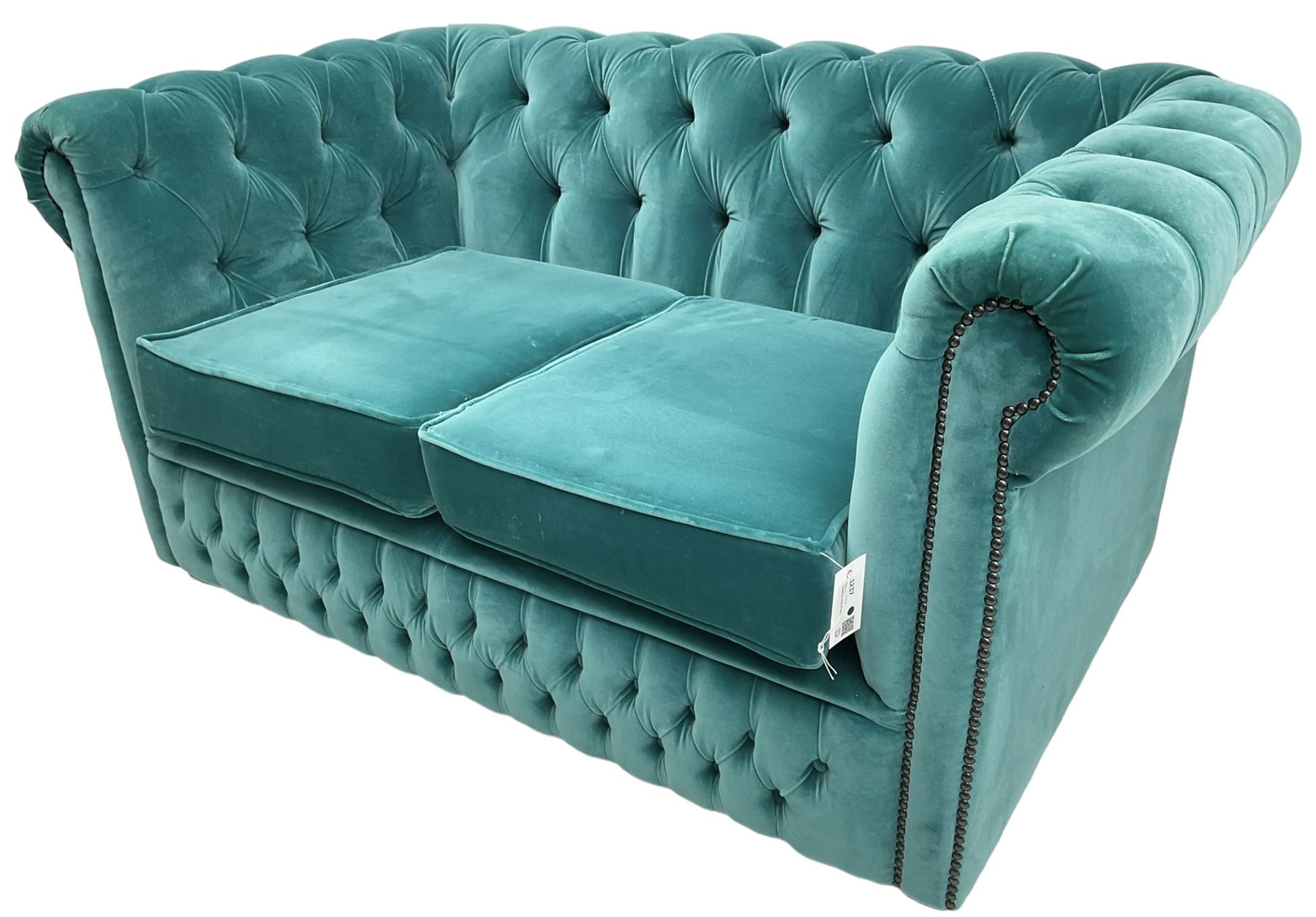 Sofas by Saxon - Chesterfield shape two-seat sofa, upholstered in buttoned aqua blue velvet fabric