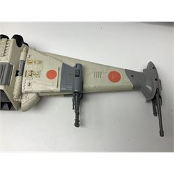 Star Wars - three space vehicles comprising B-Wing fighter and large Millenium Falcon space ship; both with instructions; and Boba Fett Slave 1; all unboxed (3)