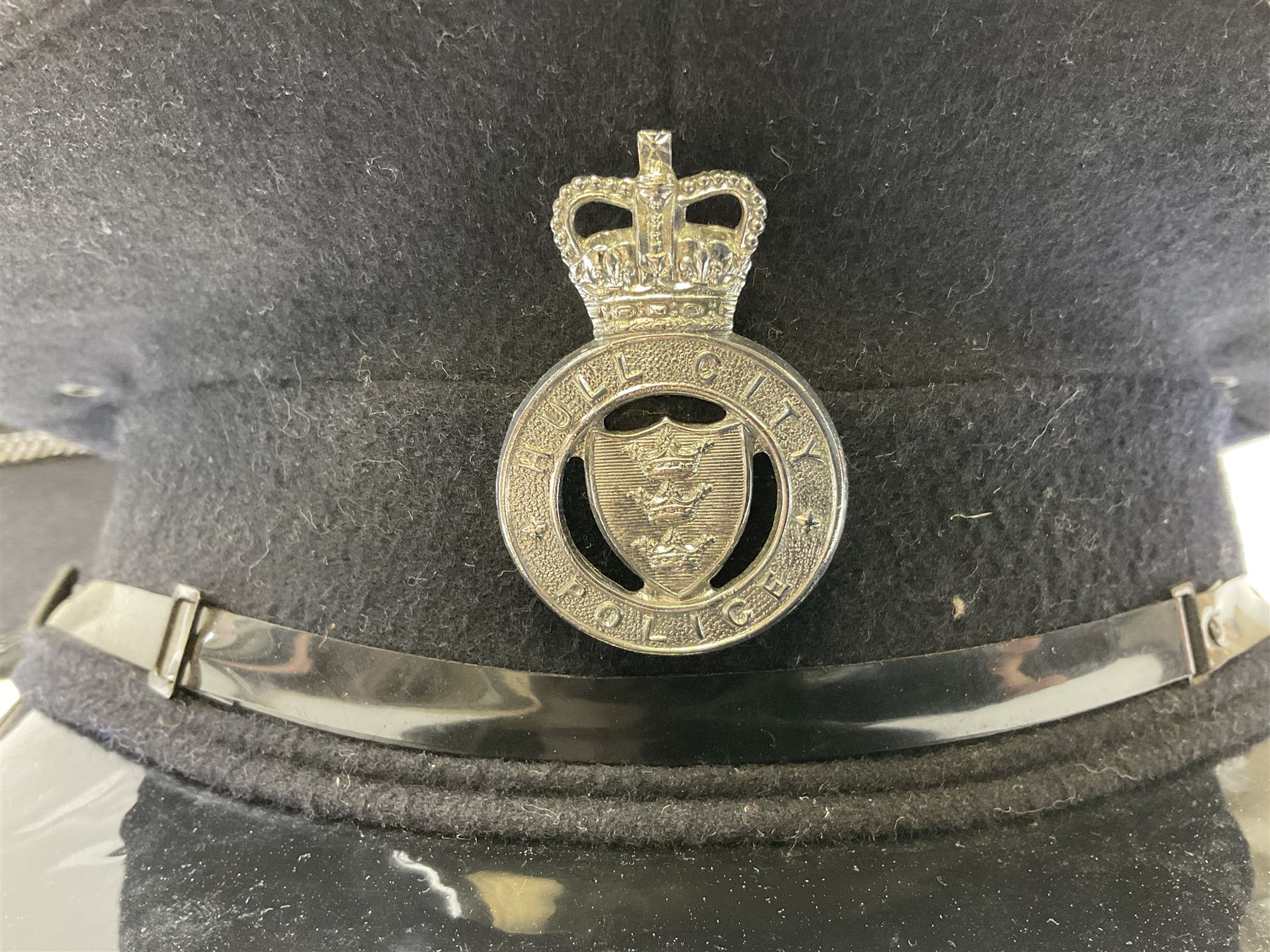  Hull City Police - Christys London helmet with king's crown night plate and a peaked cap (2)  
