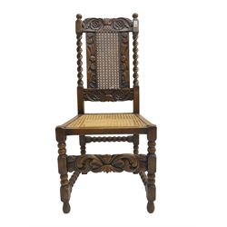Carolean design oak side chair, the cresting rail carved with foliage and flower heads, cane-work seat and back with spiral turned uprights, on turned and block supports 