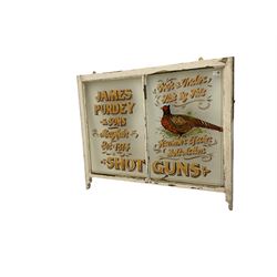 Late 19th century two pane sash window with later painted Purdy Shotguns advertising detail