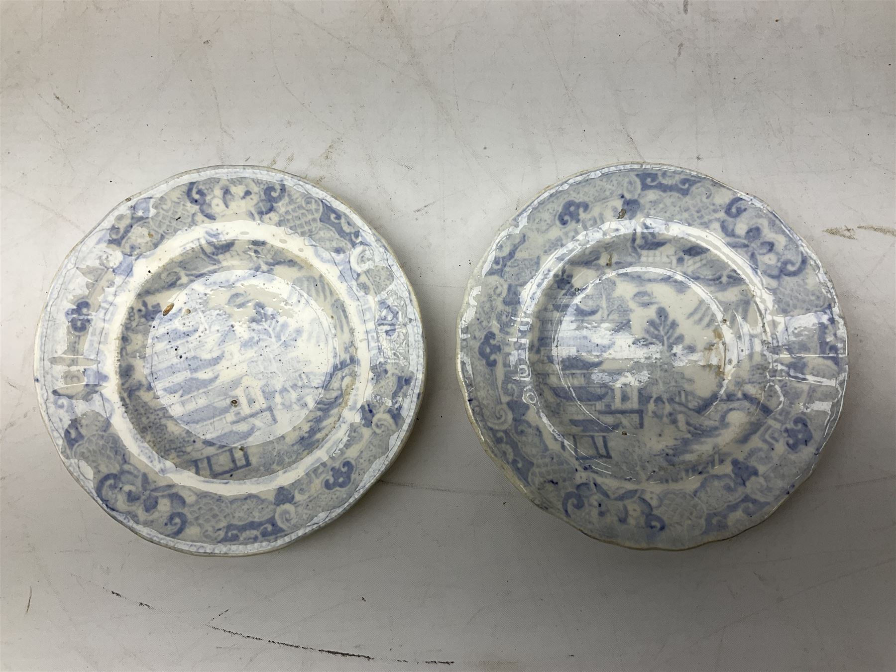 Mid 18th century Chelsea plate with gold anchor mark beneath, decorated with green floral sprays upon plain ground, the moulded cavetto shaped border with gilt rim, (A/F), D22cm, together with early 20th century Adams Tunstall Tokio pearlware slop bowl, Spode plate decorated in the Imari type pallette, with impressed and printed marks beneath, 19th century Indian Tree pattern breakfast cup and saucer, small polychrome enamelled vase and cover in the style of Samson of Paris, with marks beneath, and a pastille burner