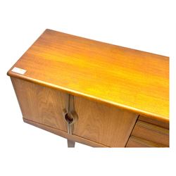 Stonehill - mid-20th century teak sideboard, three central drawers flanked by concertina cupboard doors, on tapering supports