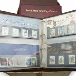 Queen Elizabeth II mint decimal stamps, mostly in presentation packs, face value of usable postage approximately 280 GBP, housed in three ring binder folders