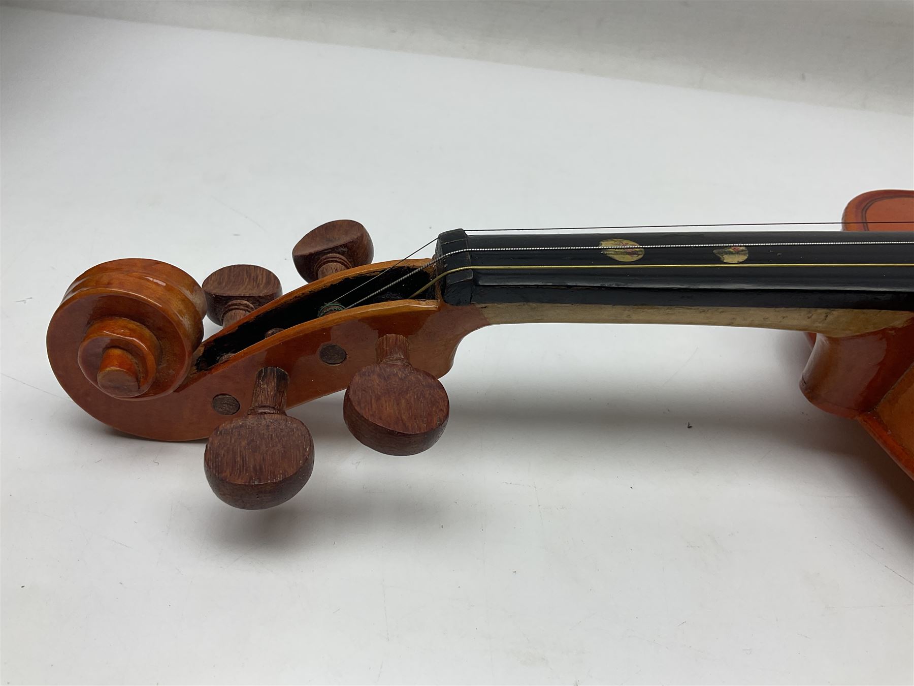 Three Stentor Student violins - three-quarter size with 33cm two-piece back; and two quarter size each with 28cm two-piece back; each in carrying case with bow (3)