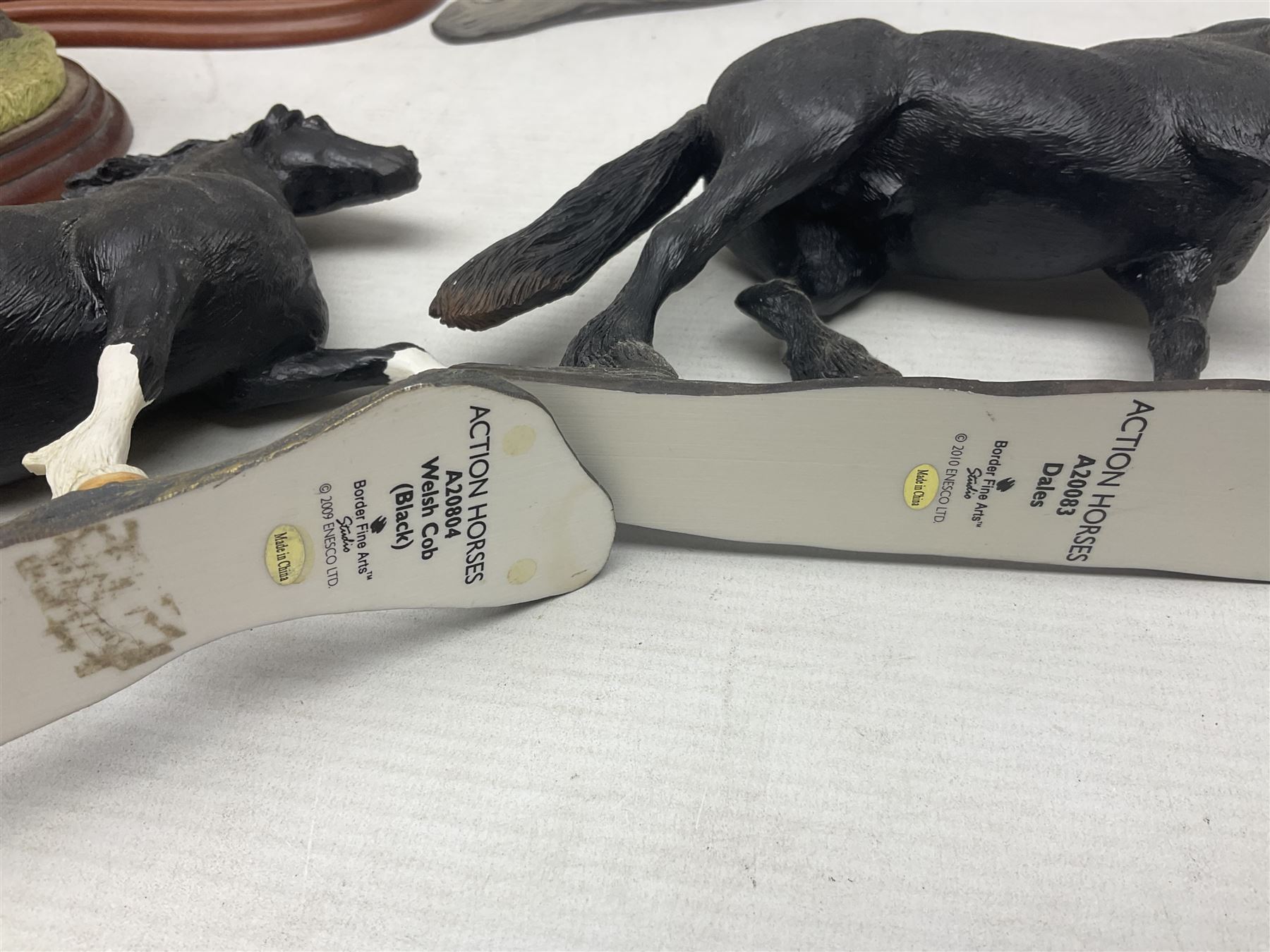 Seven Border Fine Arts figures, comprising Clydesdale Mare & Foal A0187, Highland Mare & Foal A2691 and five horses from the Action Horses series 