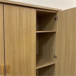 Solid light oak triple wardrobe with four drawers