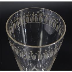 Three late 18th/early 19th century drinking glasses, with funnel and rounded funnel bowls, one example with engraved band, another with stylised cut swag, upon diamond faceted stems and conical feet, tallest H15.5cm