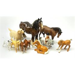 A group of Beswick figures, comprising brown Shire mare, model no 818, John Beswick Norman Thelwell horse and rider (a/f), two Palomino foals, matt glazed chestnut horse, Golden Retriever, Labrador, Dalmatian, and two Boxers.  