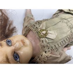 Victorian wax shoulder head doll with applied hair, inset glass eyes and jointed body with composition lower limbs; faded pink dress H35cm