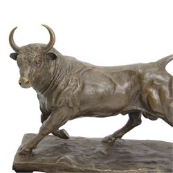 Bronze figure, modelled as a prancing bull, signed Milo, upon a marble rectangle base, base W36cm 