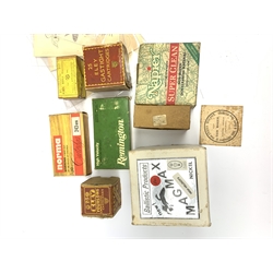 Brass and tin powder magazine by B.E. Chaplin of conical form with glazed see-through nozzle H27cm; eight reprinted gun case labels for Holland & Holland, Thomas Jackson & Son, William Ling, Watson & Hancock, Williams & Powell etc; and quantity of empty cartridge boxes and pellet tins