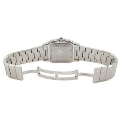 Cartier Santos Galbée gentleman's stainless steel automatic wristwatch, Ref. 2319, silvered guilloche dial with Roman numerals and secret signature at 7 o'clock, boxed purchase certificate dated 2003, pouch and service receipt dated September 2023
