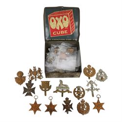 WWII seven British medals, comprising two War medals, two 1939-45 stars, African star, Italy star and French and German star, together with a collection of cap badges including The Kings Royal Rifles, Royal Engineers, East Lancashire, York and Lancaster regiment museum etc  